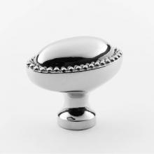 Classic Brass 1556AB - Oval Knob - 1-7/16''x15/16''