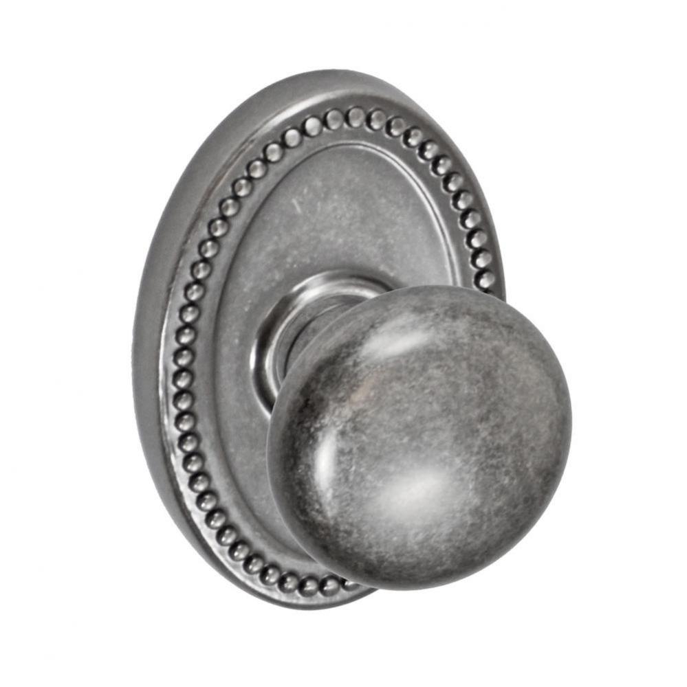 Half-Round Knob with Oval Beaded Rose Privacy Set in Antique