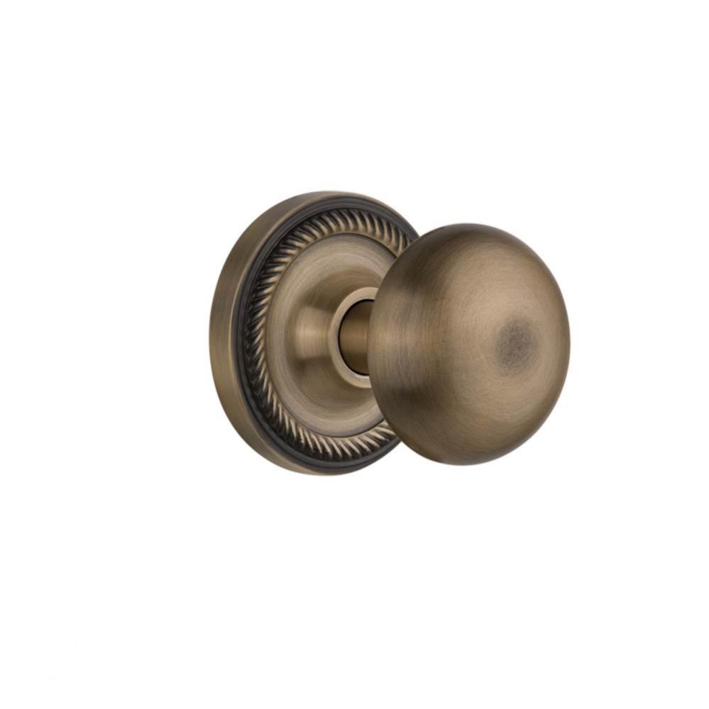Nostalgic Warehouse Rope Rosette Privacy New York Door Knob in Antique Brass