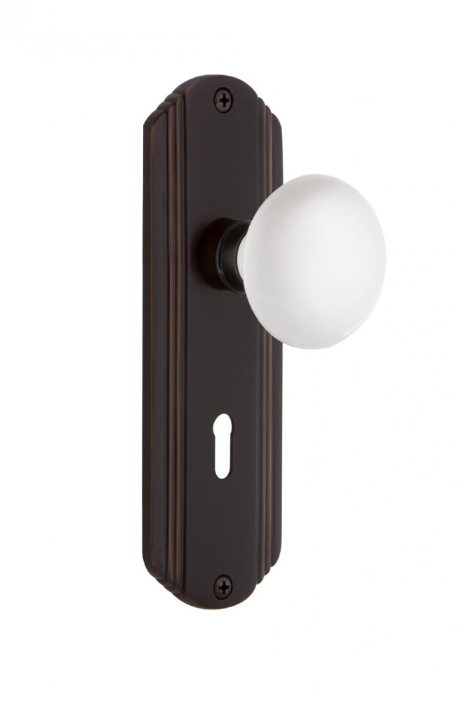 Nostalgic Warehouse Deco Plate with Keyhole Privacy White Porcelain Door Knob in Timeless Bronze