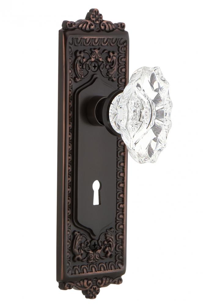 Nostalgic Warehouse Egg & Dart Plate with Keyhole Privacy Chateau Door Knob in Timeless Bronze
