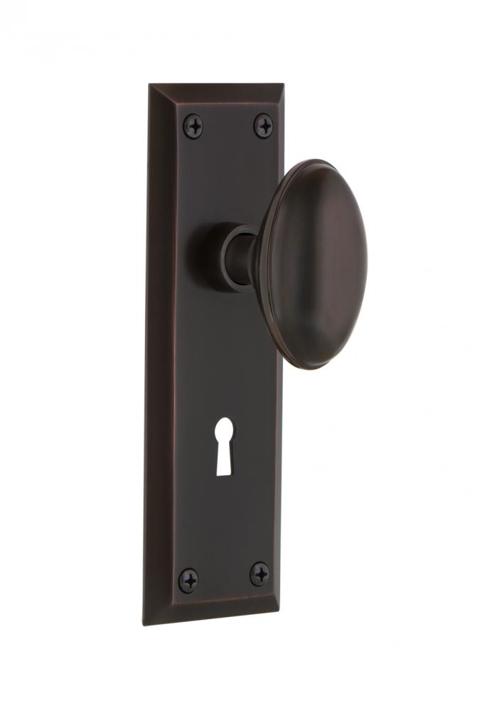 Nostalgic Warehouse New York Plate with Keyhole Privacy Homestead Door Knob in Timeless Bronze