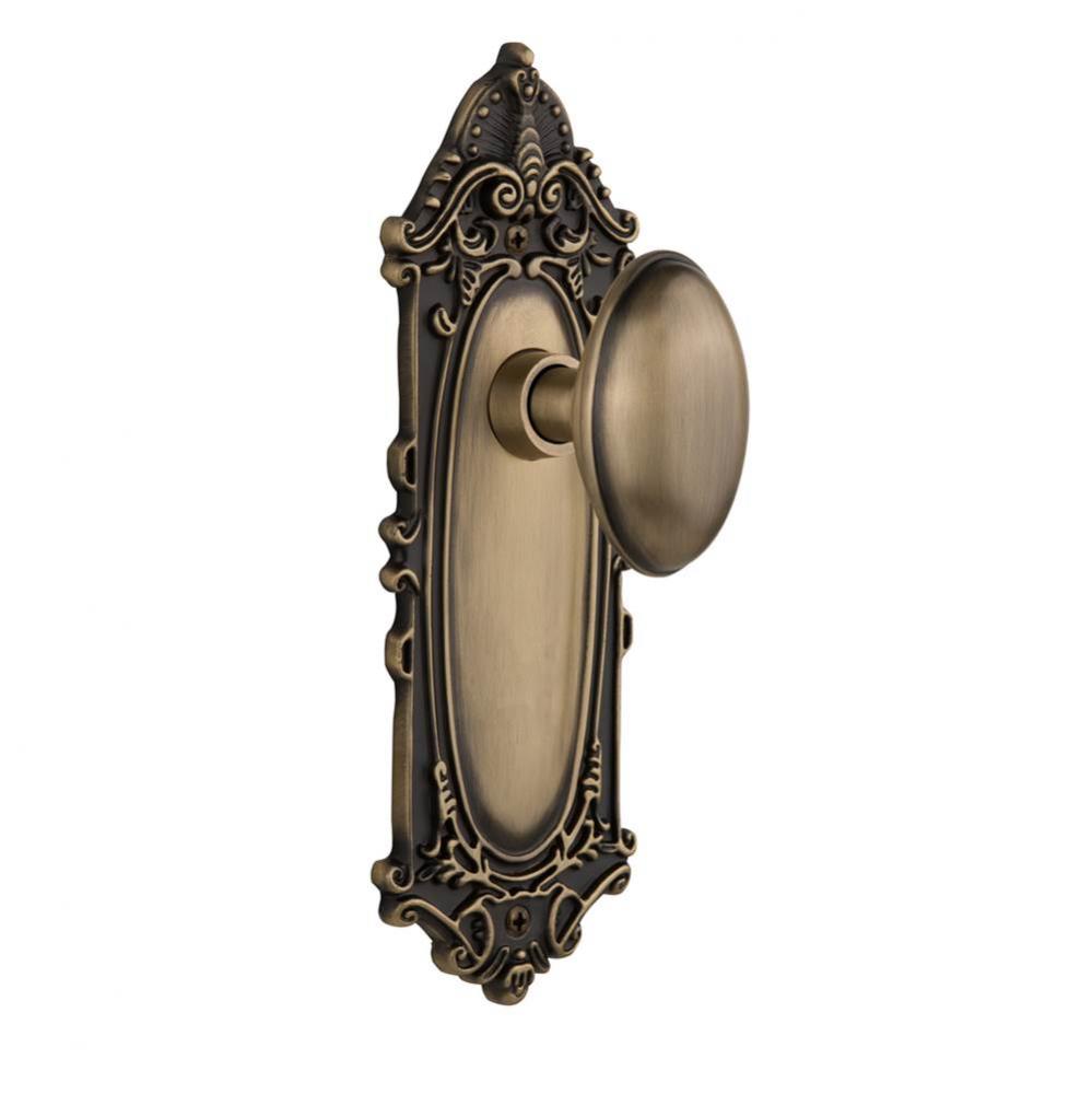 Nostalgic Warehouse Victorian Plate Privacy Homestead Door Knob in Antique Brass