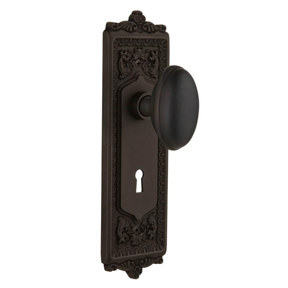 Nostalgic Warehouse Egg & Dart Plate with Keyhole Privacy Homestead Door Knob in Oil-Rubbed Br