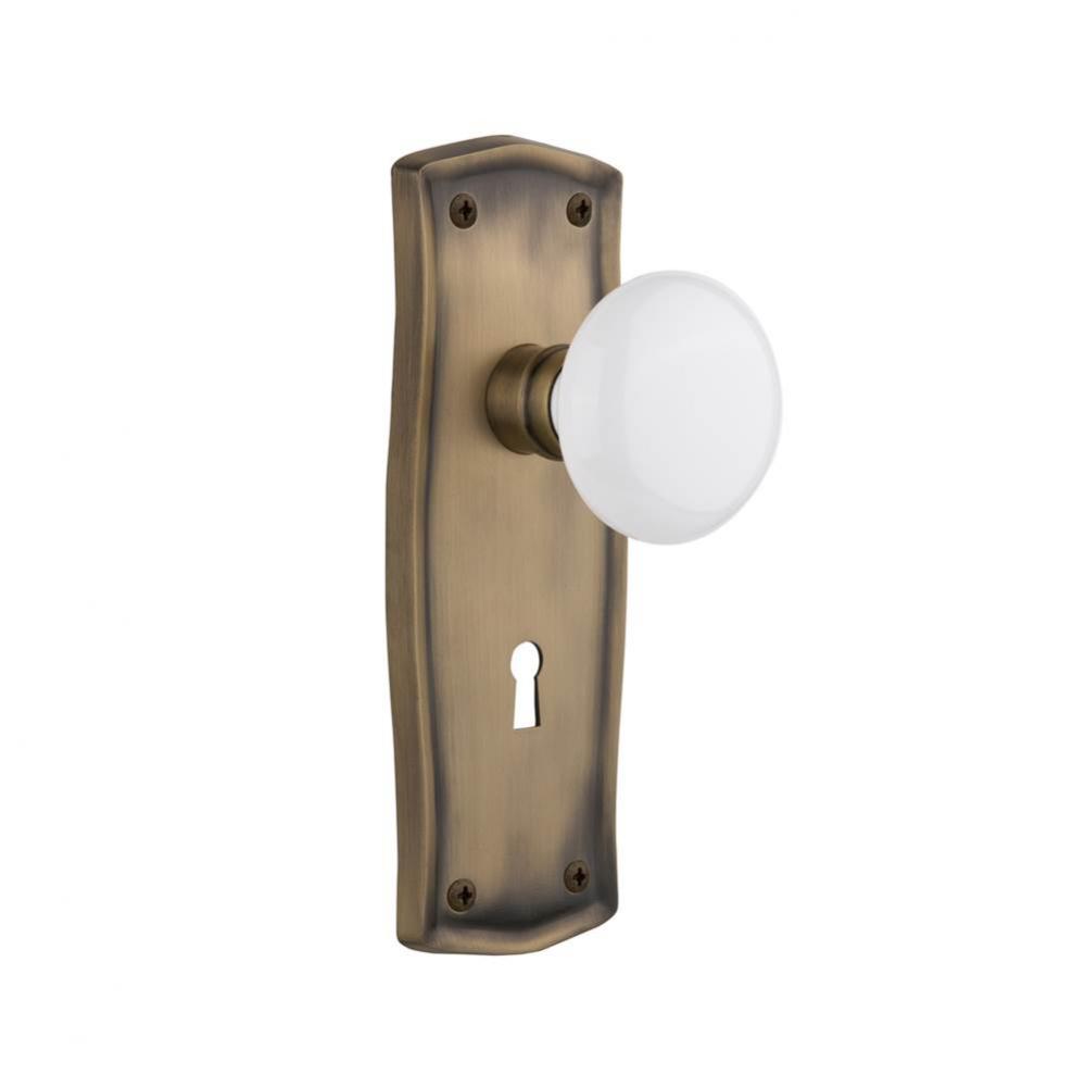 Nostalgic Warehouse Prairie Plate with Keyhole Privacy White Porcelain Door Knob in Antique Brass