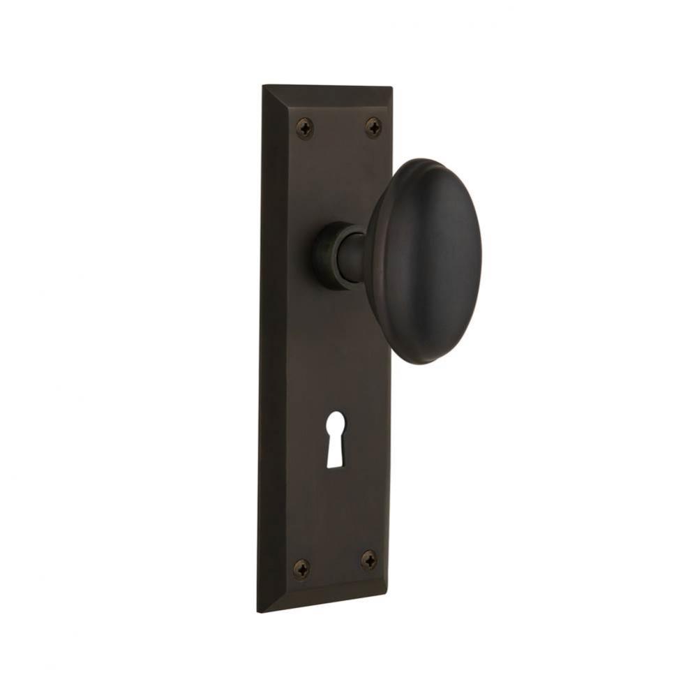 Nostalgic Warehouse New York Plate with Keyhole Privacy Homestead Door Knob in Oil-Rubbed Bronze