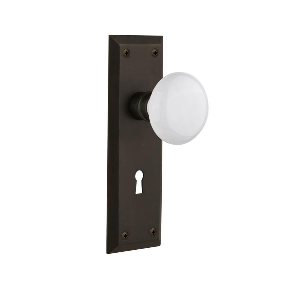Nostalgic Warehouse New York Plate with Keyhole Privacy White Porcelain Door Knob in Oil-Rubbed Br
