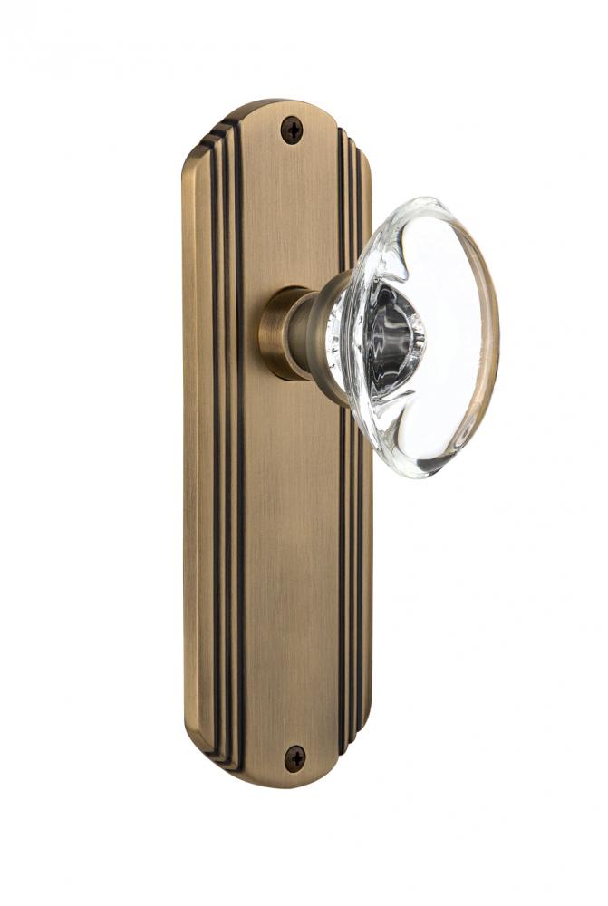 Nostalgic Warehouse Deco Plate Passage Oval Clear Crystal Glass Door Knob in Antique Brass