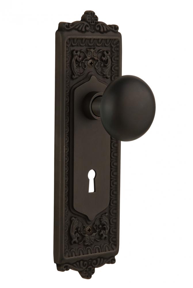 Nostalgic Warehouse Egg & Dart Plate with Keyhole Privacy New York Door Knob in Oil-Rubbed Bro