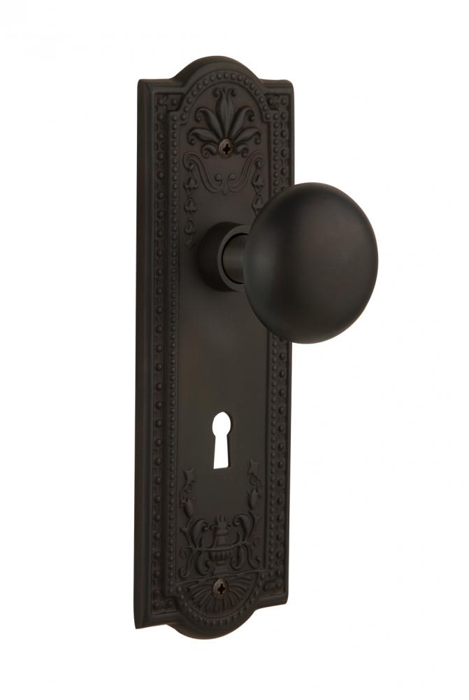 Nostalgic Warehouse Meadows Plate with Keyhole Privacy New York Door Knob in Oil-Rubbed Bronze