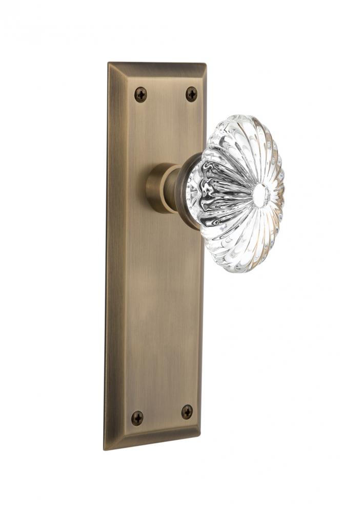 Nostalgic Warehouse New York Plate Passage Oval Fluted Crystal Glass Door Knob in Antique Brass