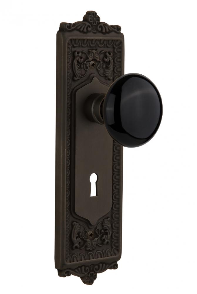 Nostalgic Warehouse Egg & Dart Plate with Keyhole Passage Black Porcelain Door Knob in Oil-Rub