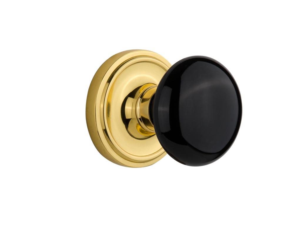 Nostalgic Warehouse Classic Rosette Double Dummy Black Porcelain Door Knob in Polished Brass