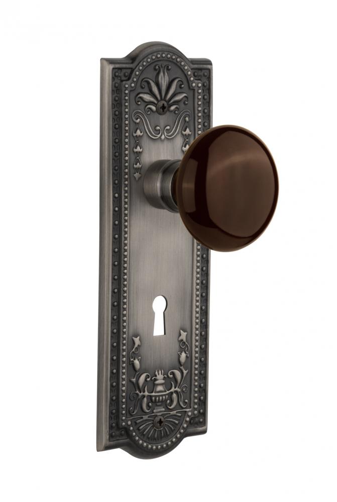 Nostalgic Warehouse Meadows Plate with Keyhole Passage Brown Porcelain Door Knob in Antique Pewter