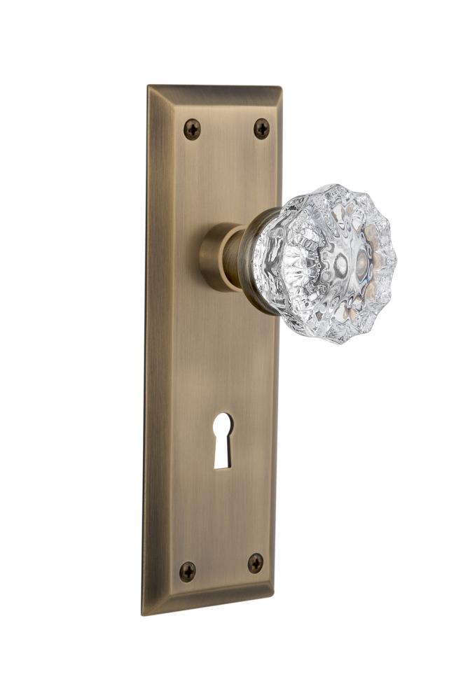 Nostalgic Warehouse New York Plate with Keyhole Passage Crystal Glass Door Knob in Antique Brass