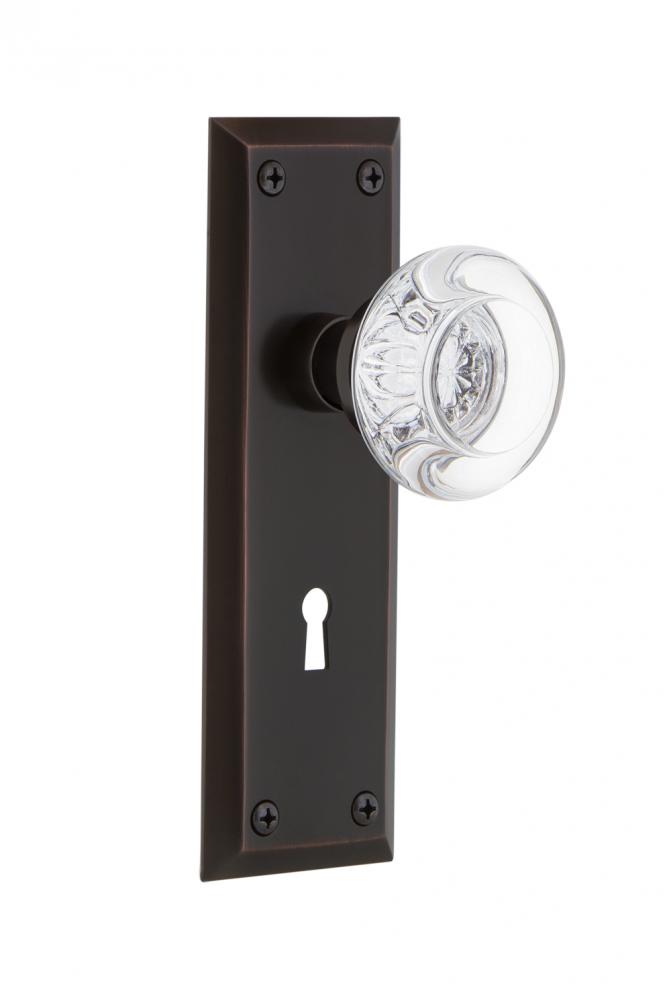 Nostalgic Warehouse New York Plate with Keyhole Passage Round Clear Crystal Glass Door Knob in Tim