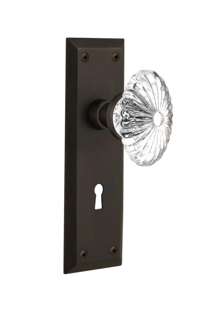 Nostalgic Warehouse New York Plate with Keyhole Privacy Oval Fluted Crystal Glass Door Knob in Oil