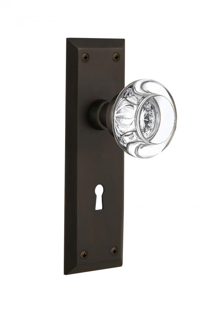 Nostalgic Warehouse New York Plate with Keyhole Privacy Round Clear Crystal Glass Door Knob in Oil