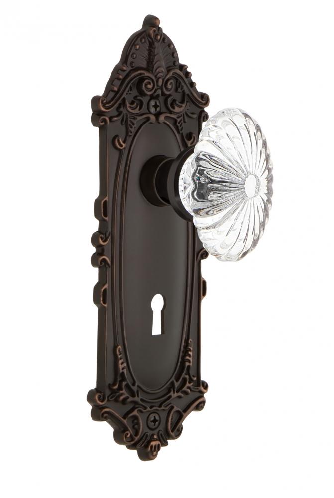 Nostalgic Warehouse Victorian Plate with Keyhole Passage Oval Fluted Crystal Glass Door Knob in Ti