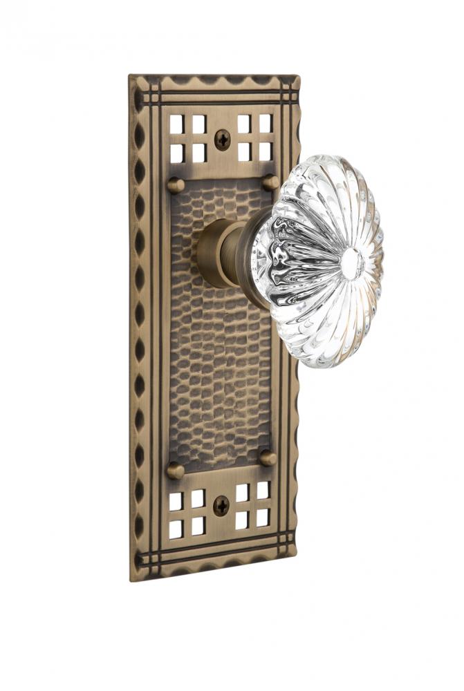 Nostalgic Warehouse Craftsman Plate Privacy Oval Fluted Crystal Glass Door Knob in Antique Brass