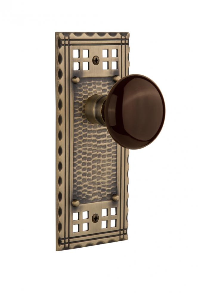 Nostalgic Warehouse Craftsman Plate Single Dummy Brown Porcelain Door Knob in Antique Brass