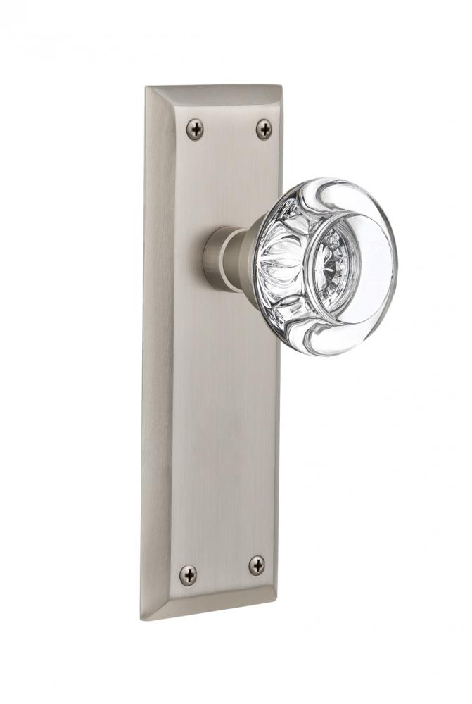 Nostalgic Warehouse New York Plate Privacy Round Clear Crystal Glass Door Knob in Satin Nickel