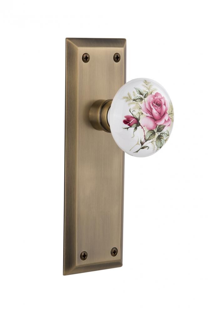 Nostalgic Warehouse New York Plate Privacy White Rose Porcelain Door Knob in Antique Brass