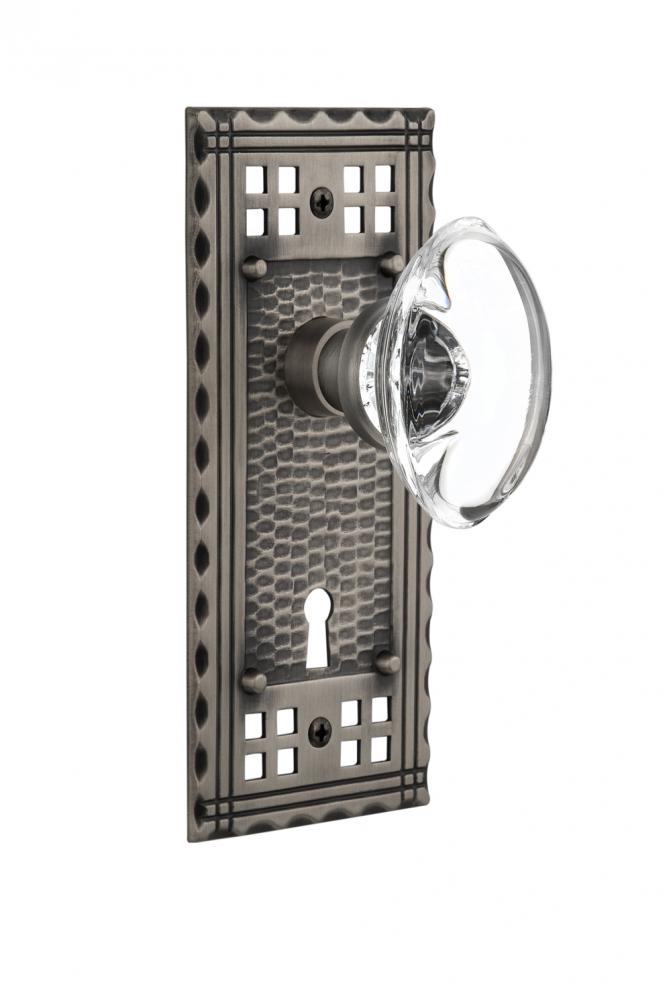 Nostalgic Warehouse Craftsman Plate with Keyhole Privacy Oval Clear Crystal Glass Door Knob in Ant