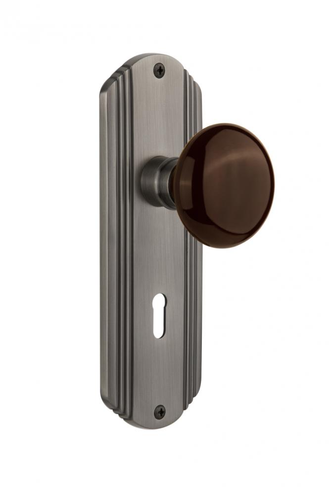 Nostalgic Warehouse Deco Plate with Keyhole Privacy Brown Porcelain Door Knob in Antique Pewter