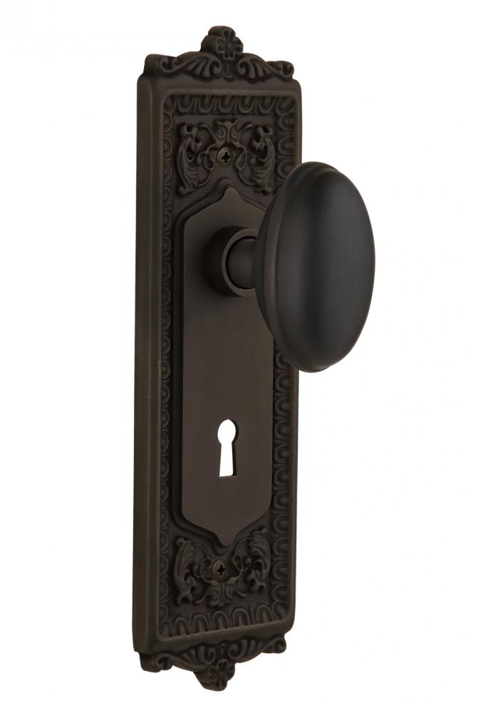 Nostalgic Warehouse Egg & Dart Plate with Keyhole Privacy Homestead Door Knob in Oil-Rubbed Br