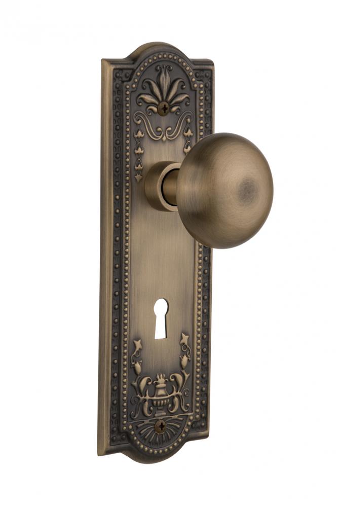 Nostalgic Warehouse Meadows Plate with Keyhole Privacy New York Door Knob in Antique Brass