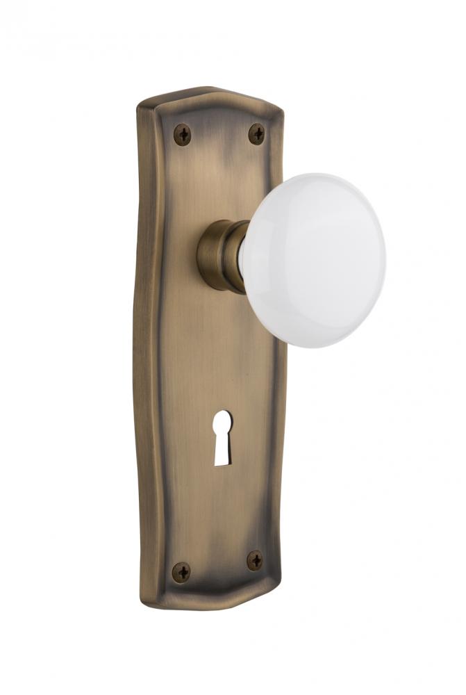 Nostalgic Warehouse Prairie Plate with Keyhole Privacy White Porcelain Door Knob in Antique Brass