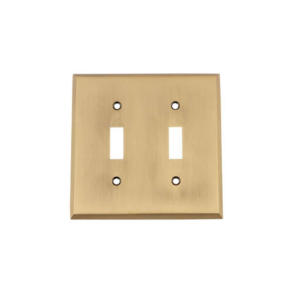Nostalgic Warehouse New York Switch Plate with Double Toggle in Antique Brass