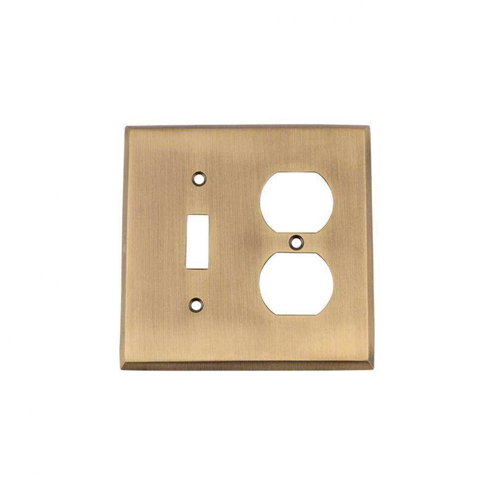Nostalgic Warehouse New York Switch Plate with Toggle and Outlet in Antique Brass