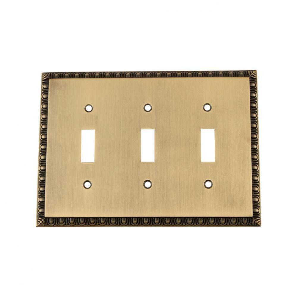 Nostalgic Warehouse Egg & Dart Switch Plate with Triple Toggle in Antique Brass