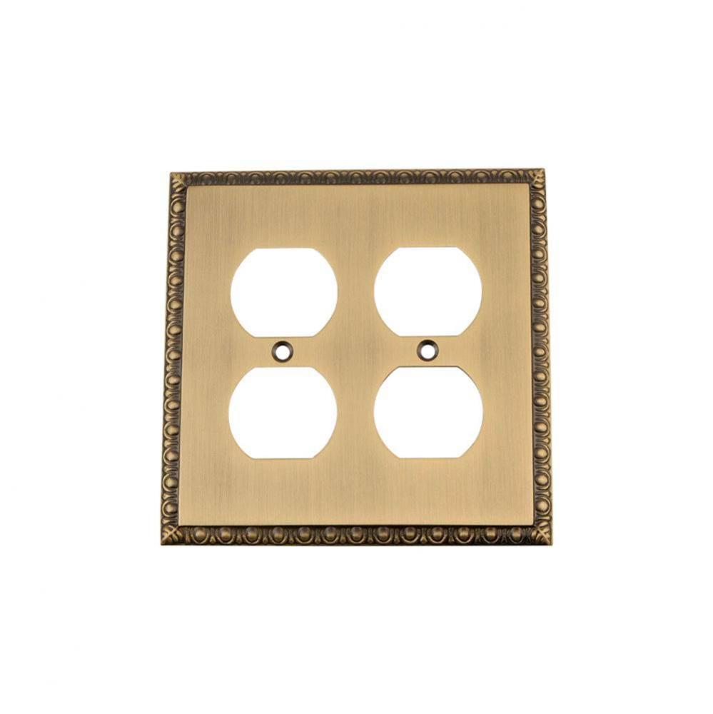 Nostalgic Warehouse Egg & Dart Switch Plate with Double Outlet in Antique Brass