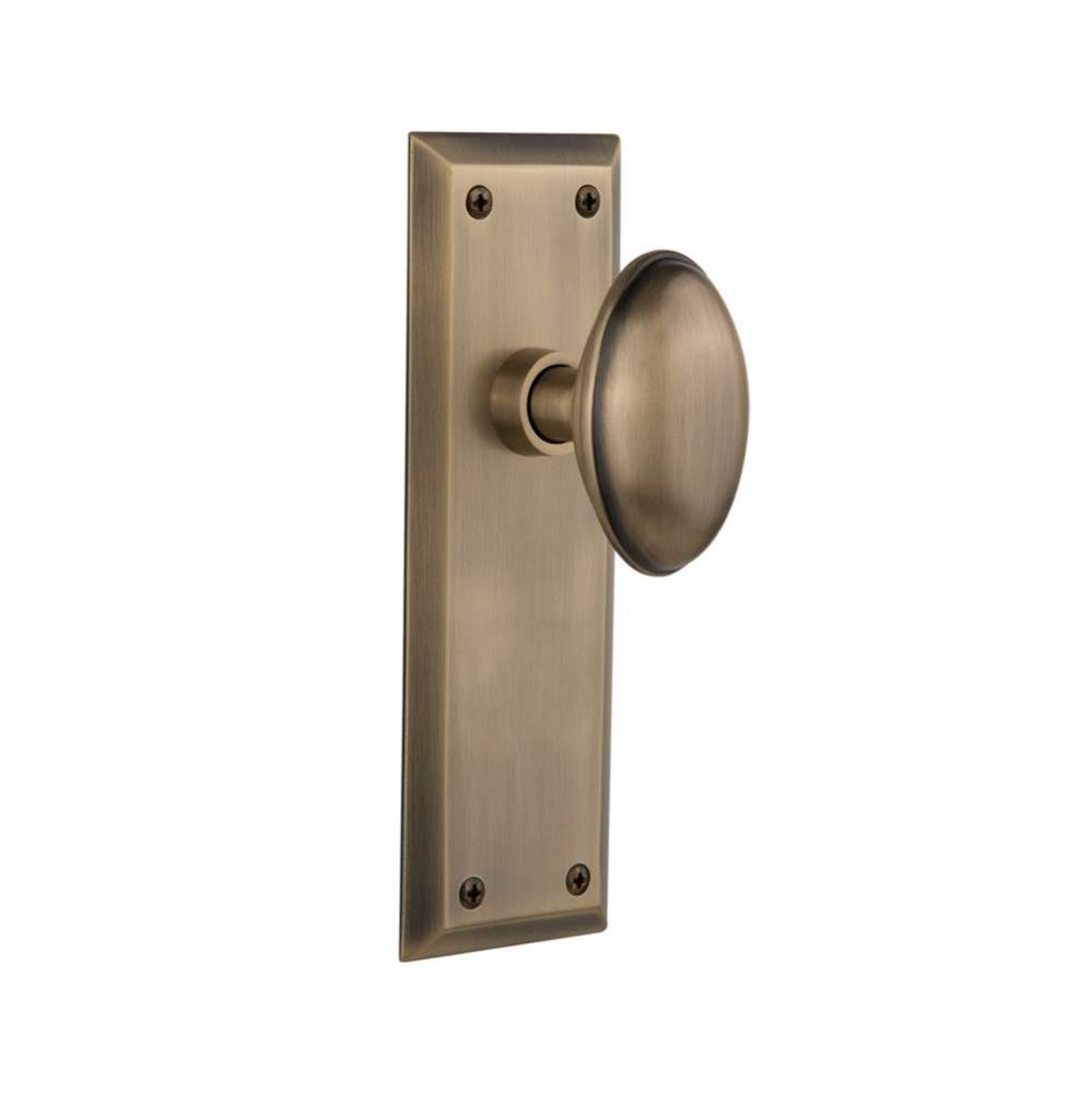 Nostalgic Warehouse New York Plate Privacy Homestead Door Knob in Antique Brass