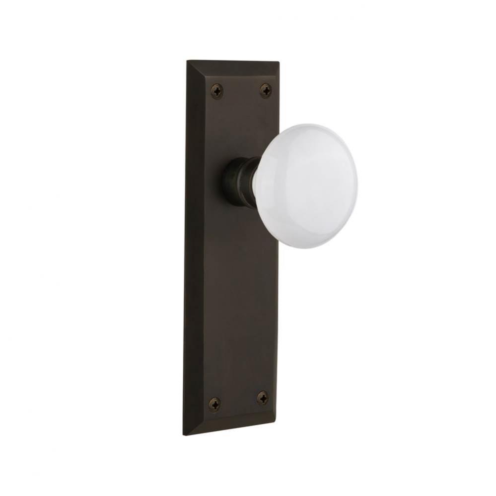 Nostalgic Warehouse New York Plate Privacy White Porcelain Door Knob in Oil-Rubbed Bronze