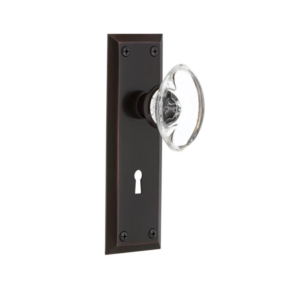 Nostalgic Warehouse New York Plate with Keyhole Passage Oval Clear Crystal Glass Door Knob in Time