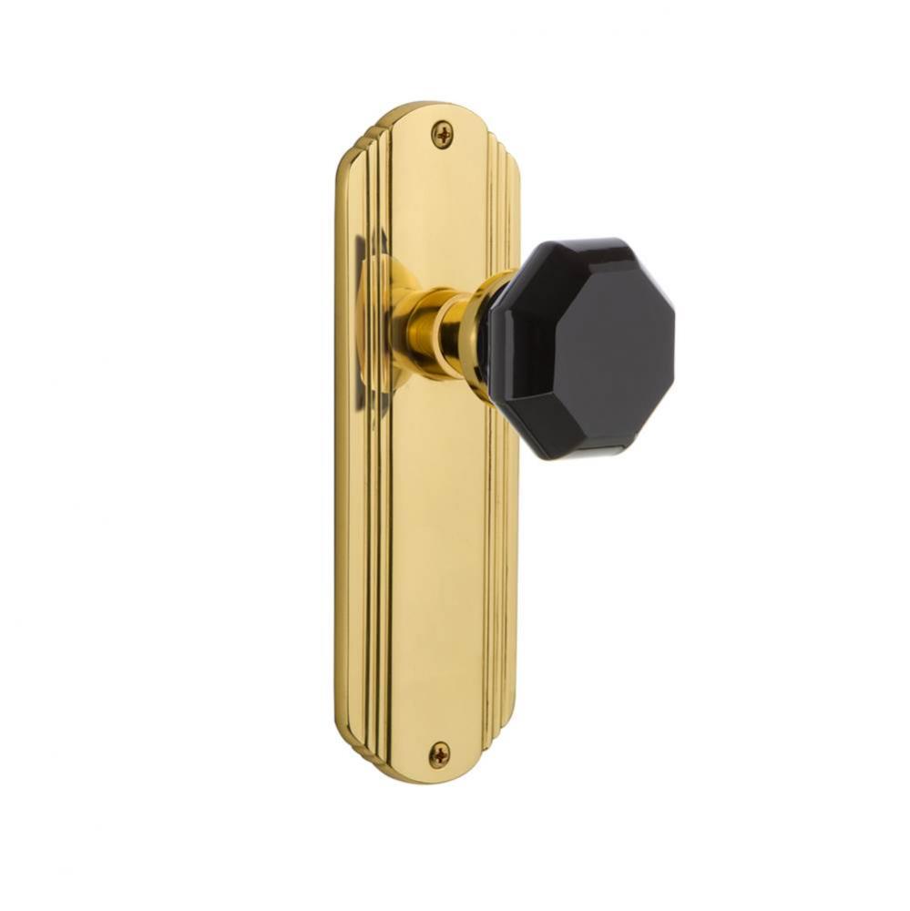 Nostalgic Warehouse Deco Plate Passage Waldorf Black Door Knob in Polished Brass