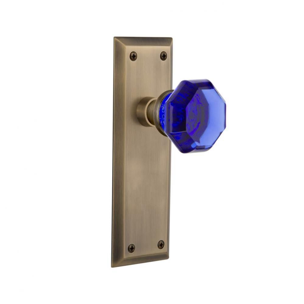Nostalgic Warehouse New York Plate Passage Waldorf Cobalt Door Knob in Antique Brass