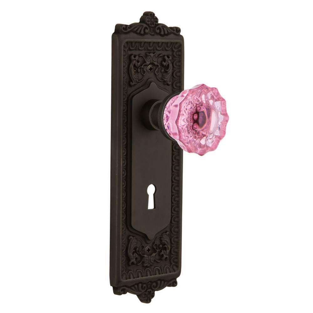 Nostalgic Warehouse Egg & Dart Plate with Keyhole Passage Crystal Pink Glass Door Knob in Oil-
