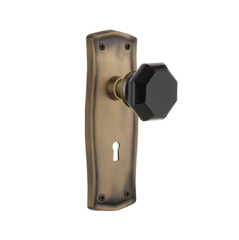 Nostalgic Warehouse Prairie Plate with Keyhole Passage Waldorf Black Door Knob in Antique Brass