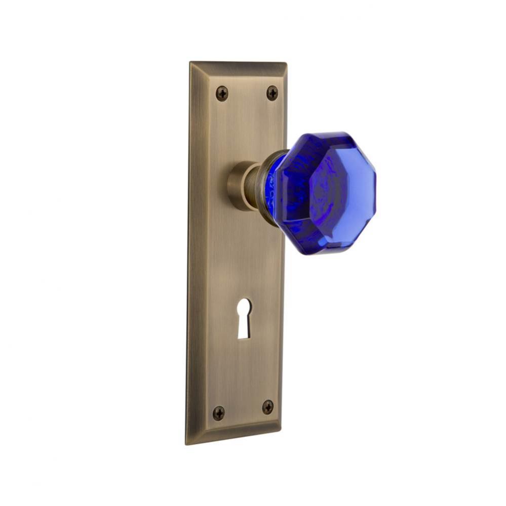 Nostalgic Warehouse New York Plate with Keyhole Privacy Waldorf Cobalt Door Knob in Antique Brass