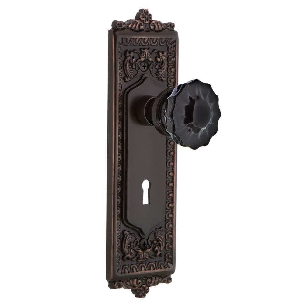 Nostalgic Warehouse Egg & Dart Plate with Keyhole Privacy Crystal Black Glass Door Knob in Tim