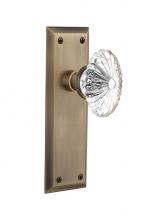 Nostalgic Warehouse 711781 - Nostalgic Warehouse New York Plate Passage Oval Fluted Crystal Glass Door Knob in Antique Brass