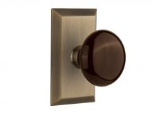 Nostalgic Warehouse 713290 - Nostalgic Warehouse Studio Plate Passage Brown Porcelain Door Knob in Antique Brass