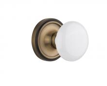 Nostalgic Warehouse 714570 - Nostalgic Warehouse Classic Rosette Privacy White Porcelain Door Knob in Antique Brass
