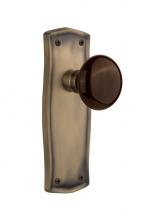 Nostalgic Warehouse 717442 - Nostalgic Warehouse Prairie Plate Privacy Brown Porcelain Door Knob in Antique Brass