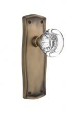 Nostalgic Warehouse 717538 - Nostalgic Warehouse Prairie Plate Privacy Round Clear Crystal Glass Door Knob in Antique Brass